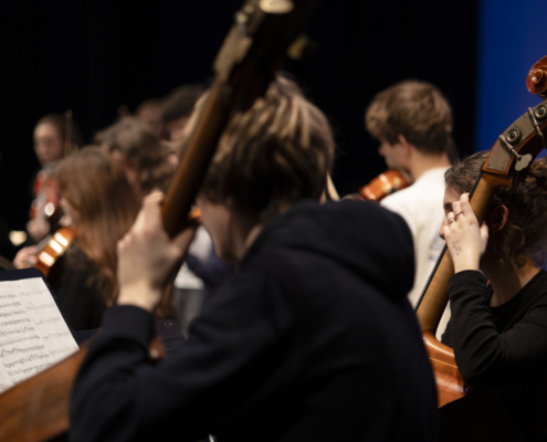 Musicien.nes de l'Orchestre Symphonique à l'auditorium Jacques-Lancelot